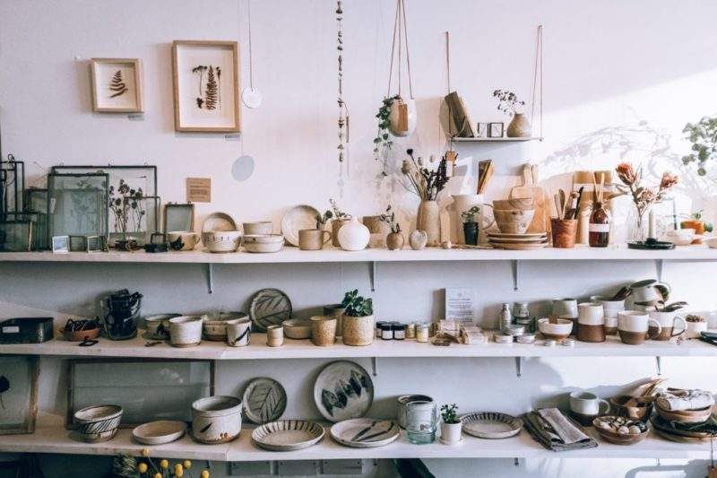 assorted-ceramics-on-wooden-shelves-3626588 3